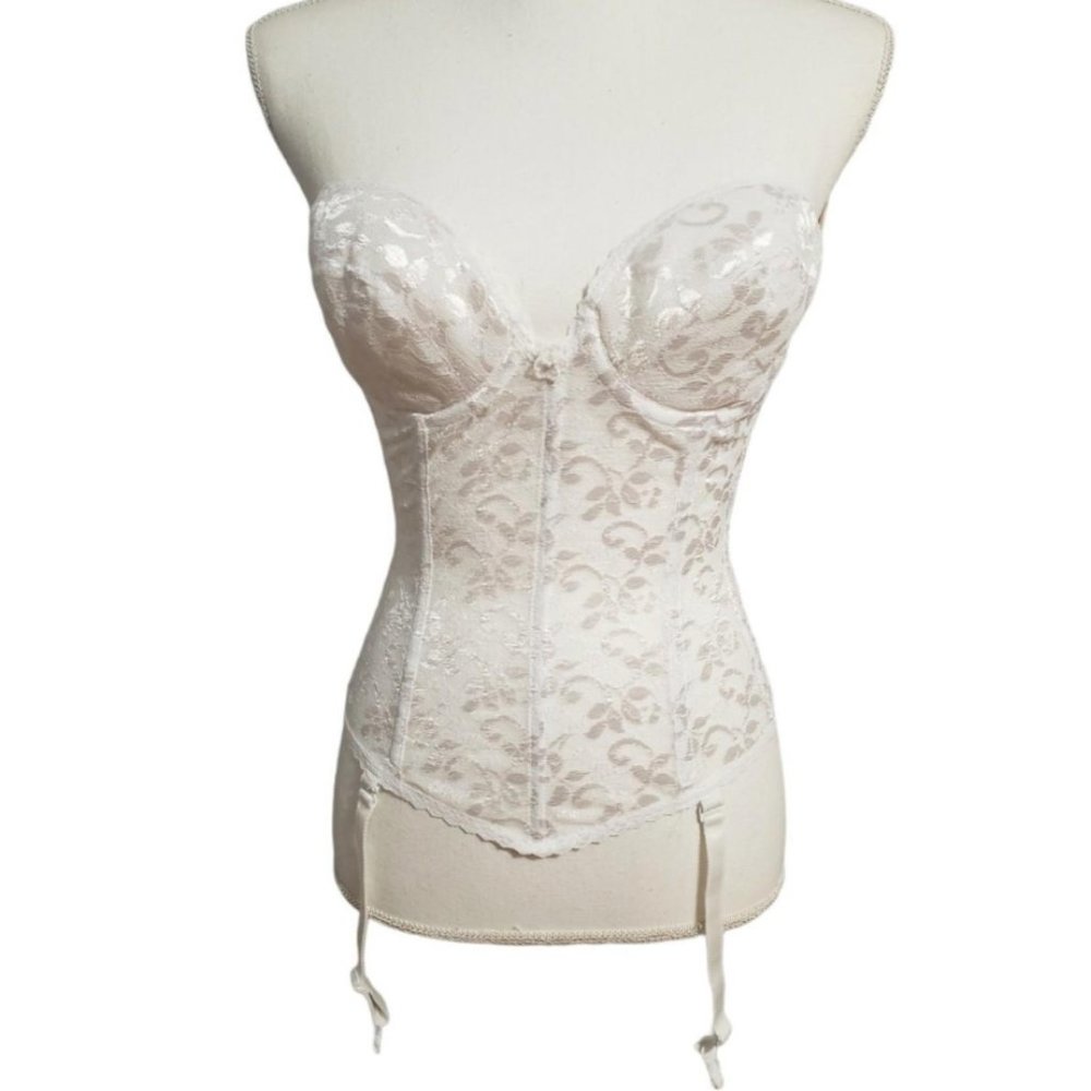 white floral lace corset with boning to create a slimming figure